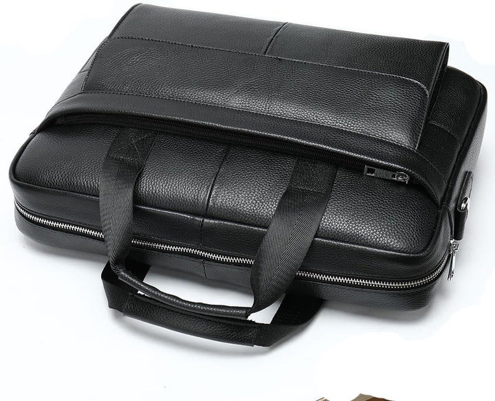 Sophisticated men's leather travel briefcase. Professional 15-inch laptop bag with secure compartments.