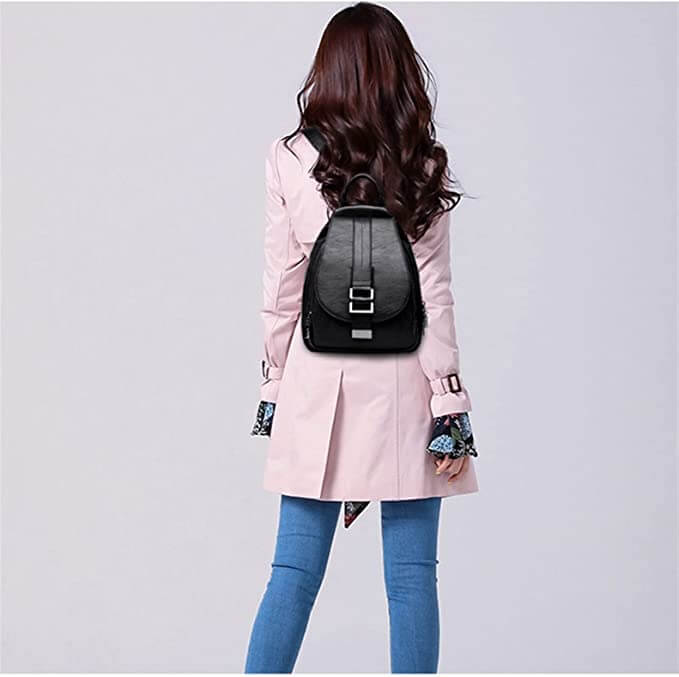 Durable water-resistant leather backpack for women. Great for city exploration and everyday carry.