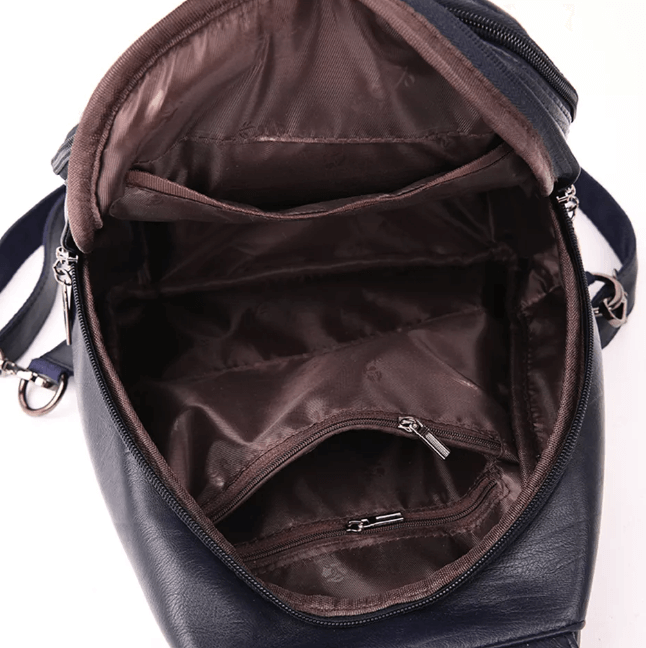Soft sheepskin leather texture on a women's water-resistant fashion backpack. Luxury everyday carry.