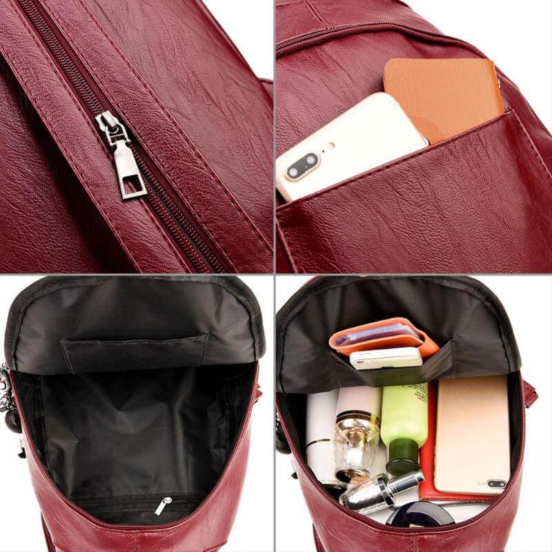 Open women's water-resistant leather backpack showing ample storage. Ideal for travel & daily use.