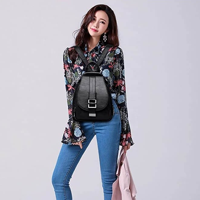 Women's anti-theft water-resistant leather backpack. Secure luxury travel bag and shoulder bag.