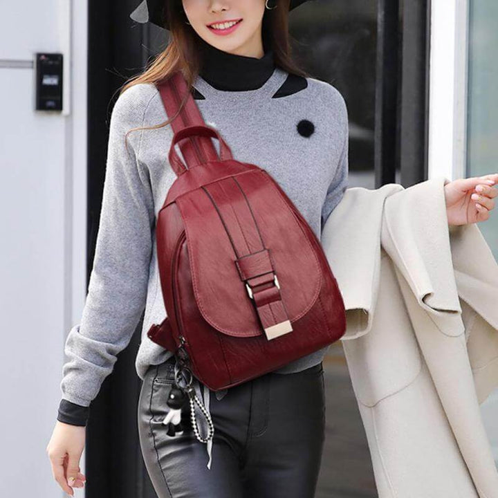 Professional women's water-resistant leather backpack. Ideal for work, travel & everyday carry fashion.