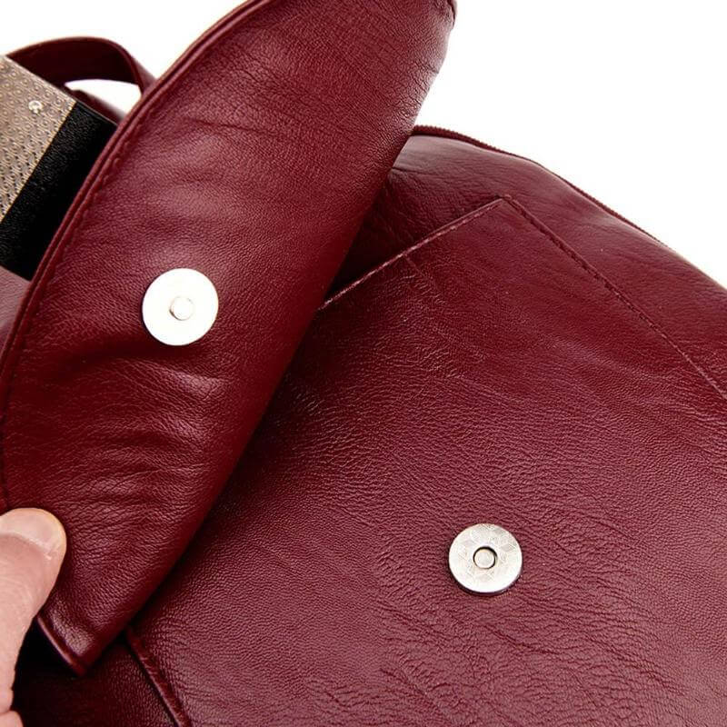 Versatile women's premium water-resistant leather backpack. Ideal travel bag & everyday carry solution.