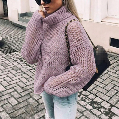 Chic women's oversized chunky turtleneck sweater, an essential for cozy fall & winter fashion.