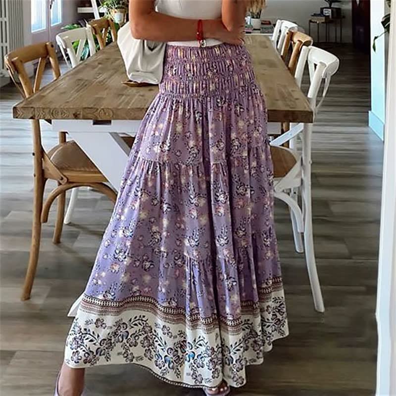 Bohemian tiered midi skirt for women, featuring an elastic waist and a relaxed, flowing fit, ideal for summer.