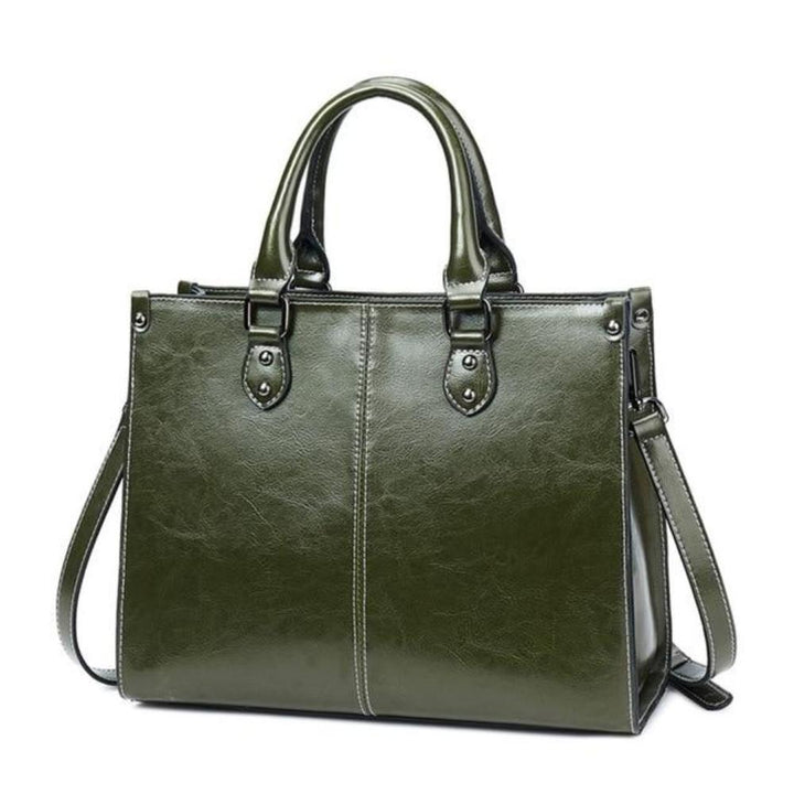 Practical women's elegant leather tote handbag with zipper, ideal for everyday carry and organizing essentials.