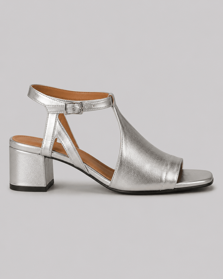 Shimmering silver block heel sandals for women, perfect for elegant summer parties & occasion wear.