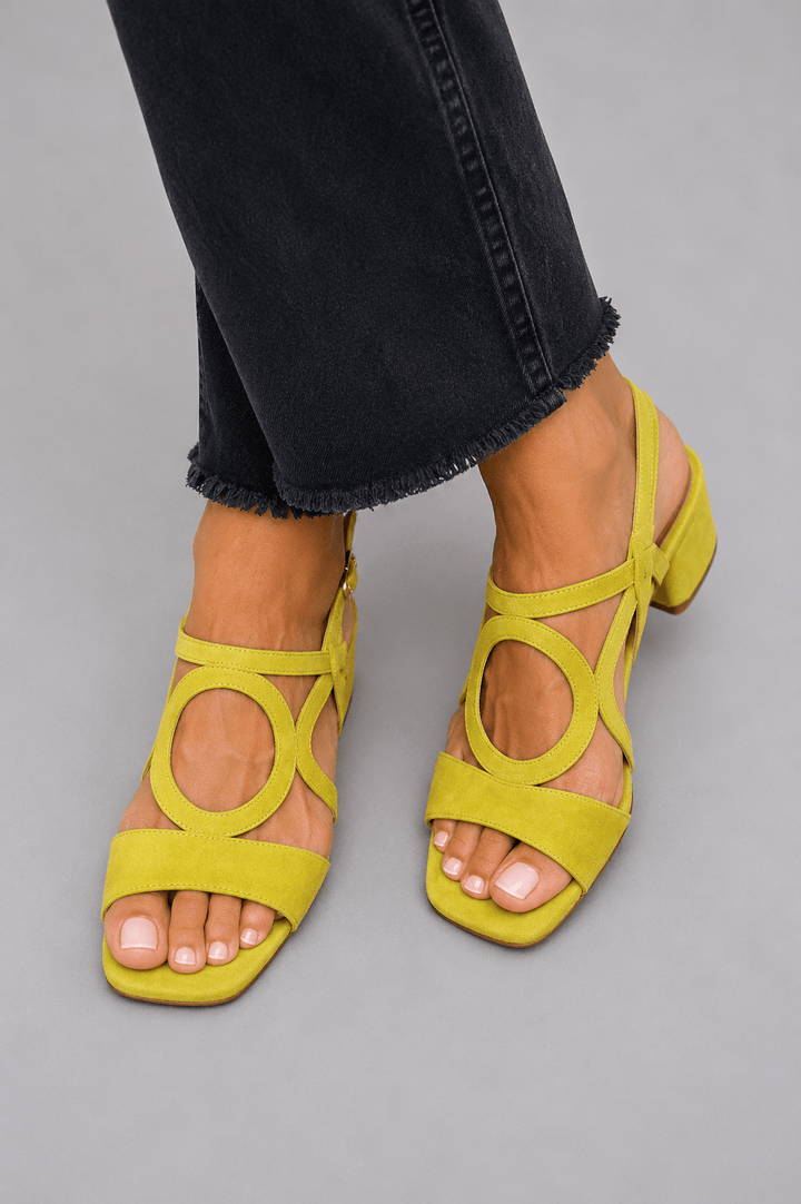 Elegant women's summer sandals. Vibrant block heels, open toe design. Perfect for parties, vacations, & stylish events.