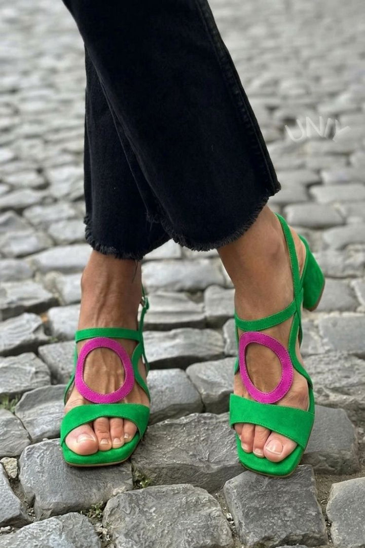 Open toe heeled sandals for women. Vibrant summer fashion with a comfortable block heel. Elegant, party-ready footwear.
