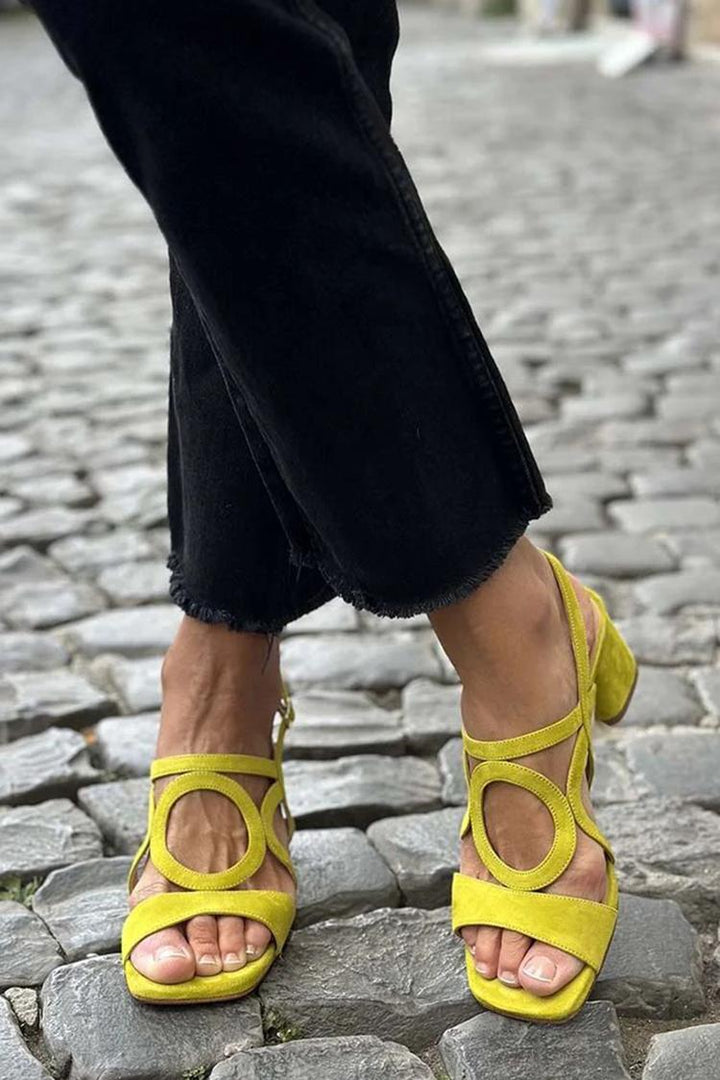 Comfortable women's heeled sandals. Vibrant summer block heels, open toe. Stylish & easy-to-wear footwear for women.