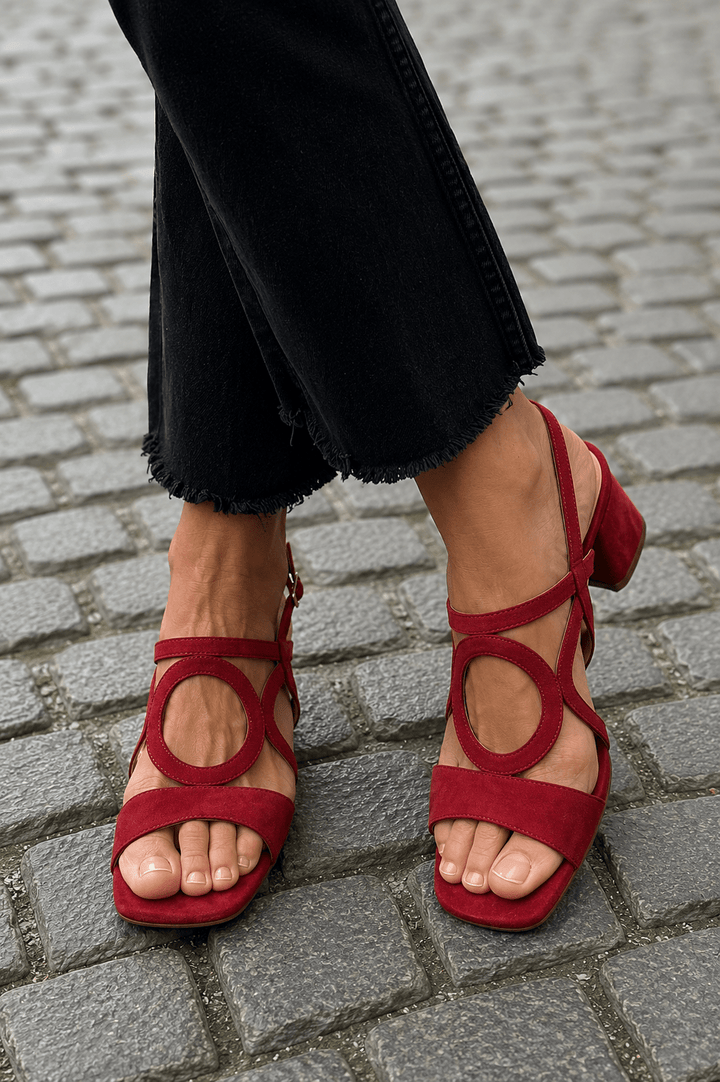 Fashionable women's vibrant summer heeled sandals. Elegant block heel, open toe. Comfortable & stylish footwear.