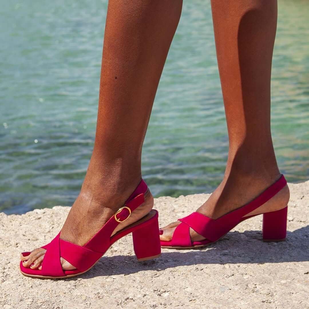 Elegant women's block heel sandals with secure ankle strap, chic design for comfortable summer fashion.