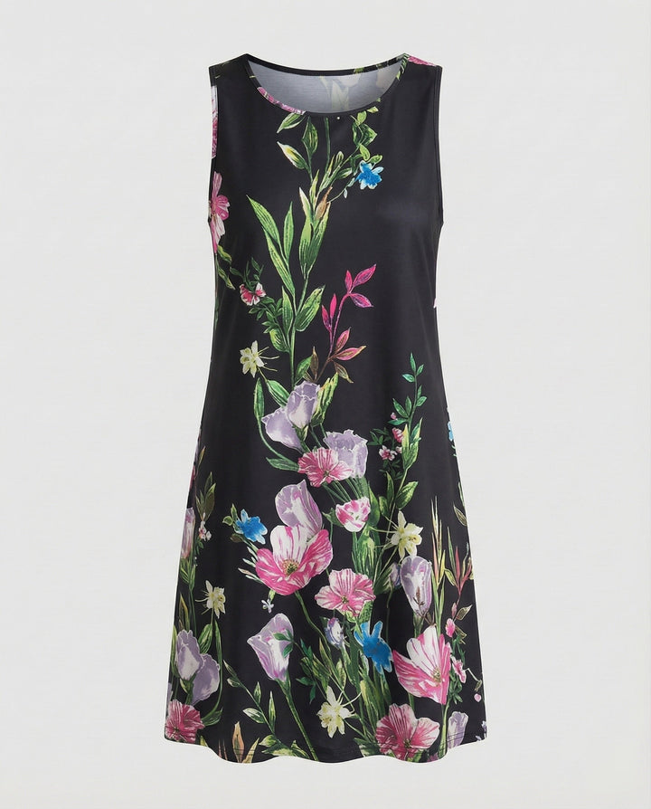 Elegant sleeveless women's summer dress with a vibrant artistic print, perfect for casual outings.