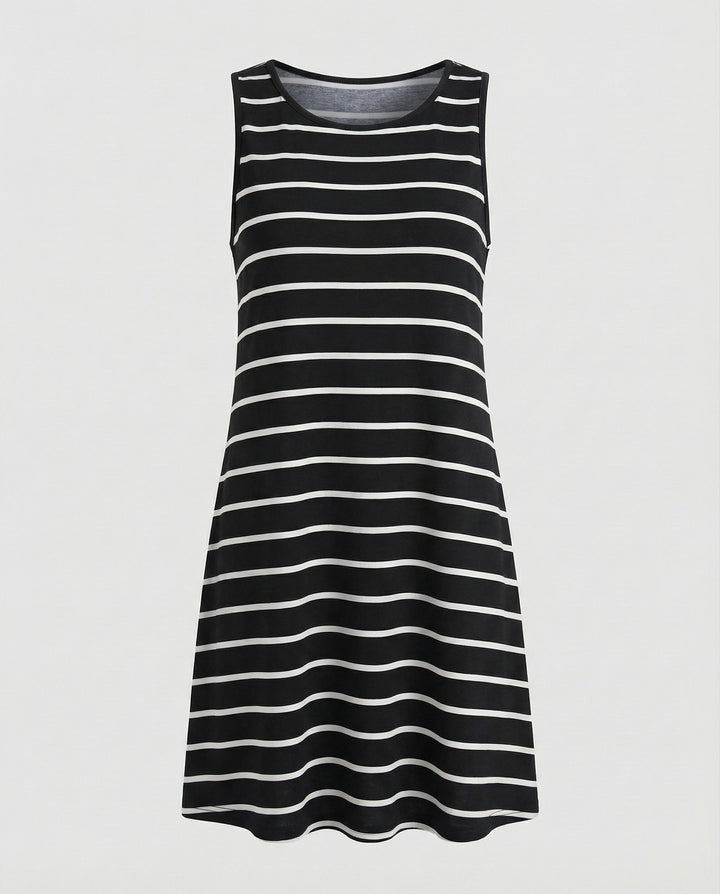 Chic and flowy women's sleeveless dress, vibrant artistic print for casual summer elegance.