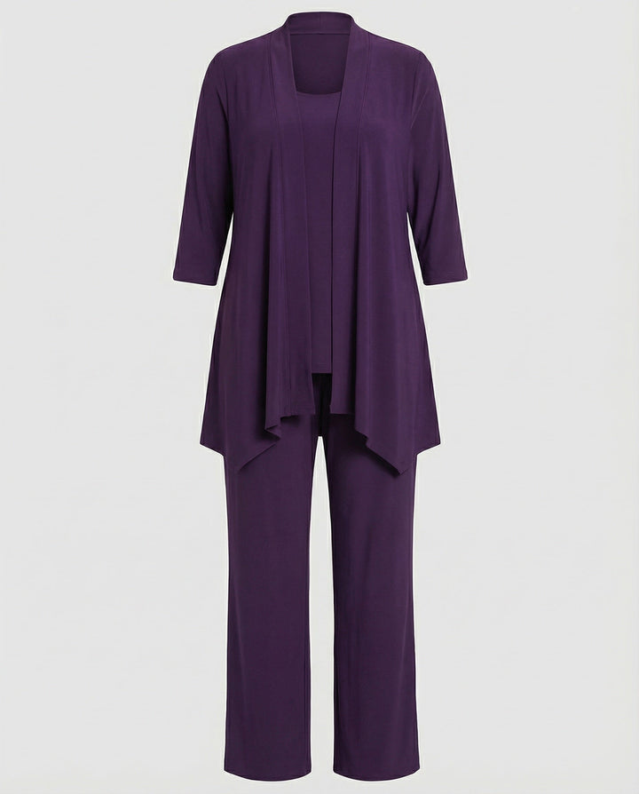 Modern women's formal attire: a sophisticated three-piece pantsuit, perfect for events and professional settings.
