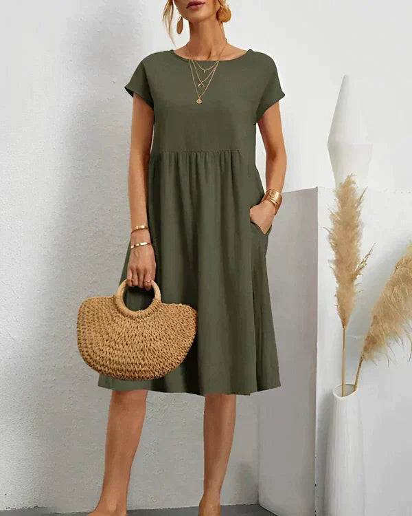 Elegant women's round neck midi dress, a comfortable and versatile staple for chic day to evening wear.