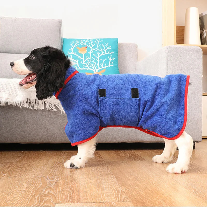 Dog wearing a green quick-drying bathrobe, highlighting the ease of movement and warmth it provides.