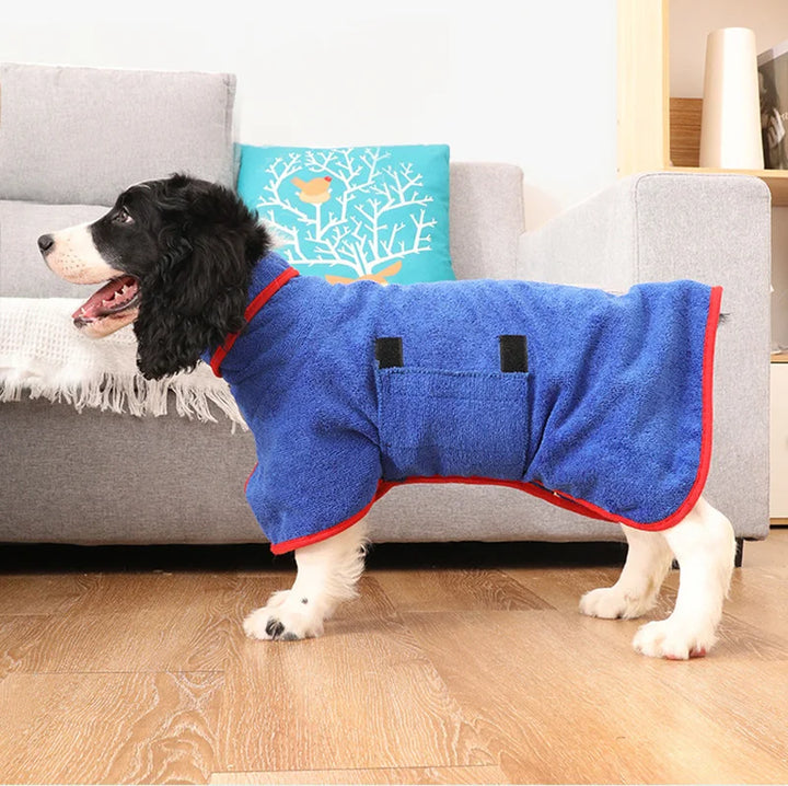 Dog wearing a green quick-drying bathrobe, highlighting the ease of movement and warmth it provides.