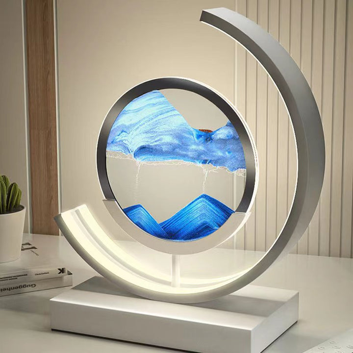 Quicksand art table lamp with rotating sand patterns, 360-degree rotation, elegant design, soft LED light, stress relief.