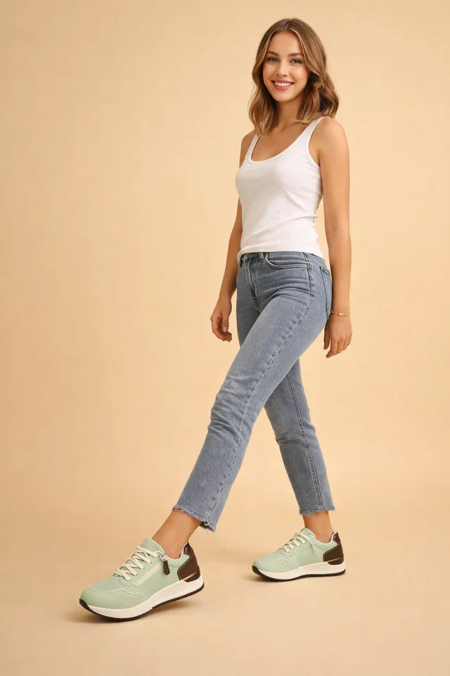 Women's athletic casual sneakers, providing cushioned support for everyday comfort and style.
