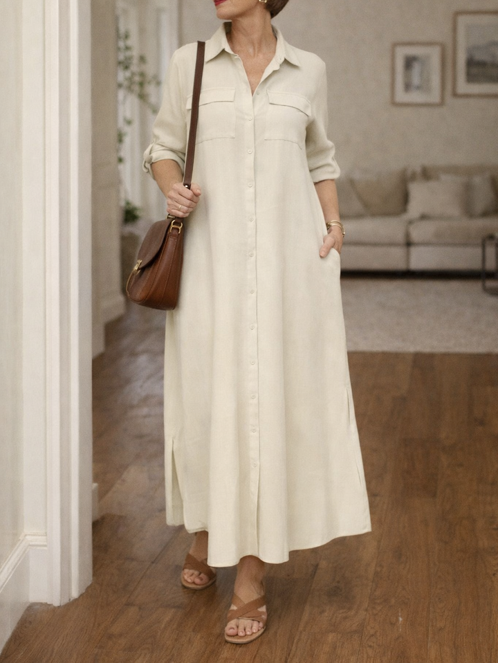 Close-up of the collared neckline and button-front detail on a women's relaxed fit maxi dress, ideal for smart casual style.