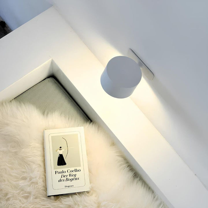 "Rechargeable 360° rotating wall light, features sleek design with magnetic ball joint, touch control, and adjustable lightin