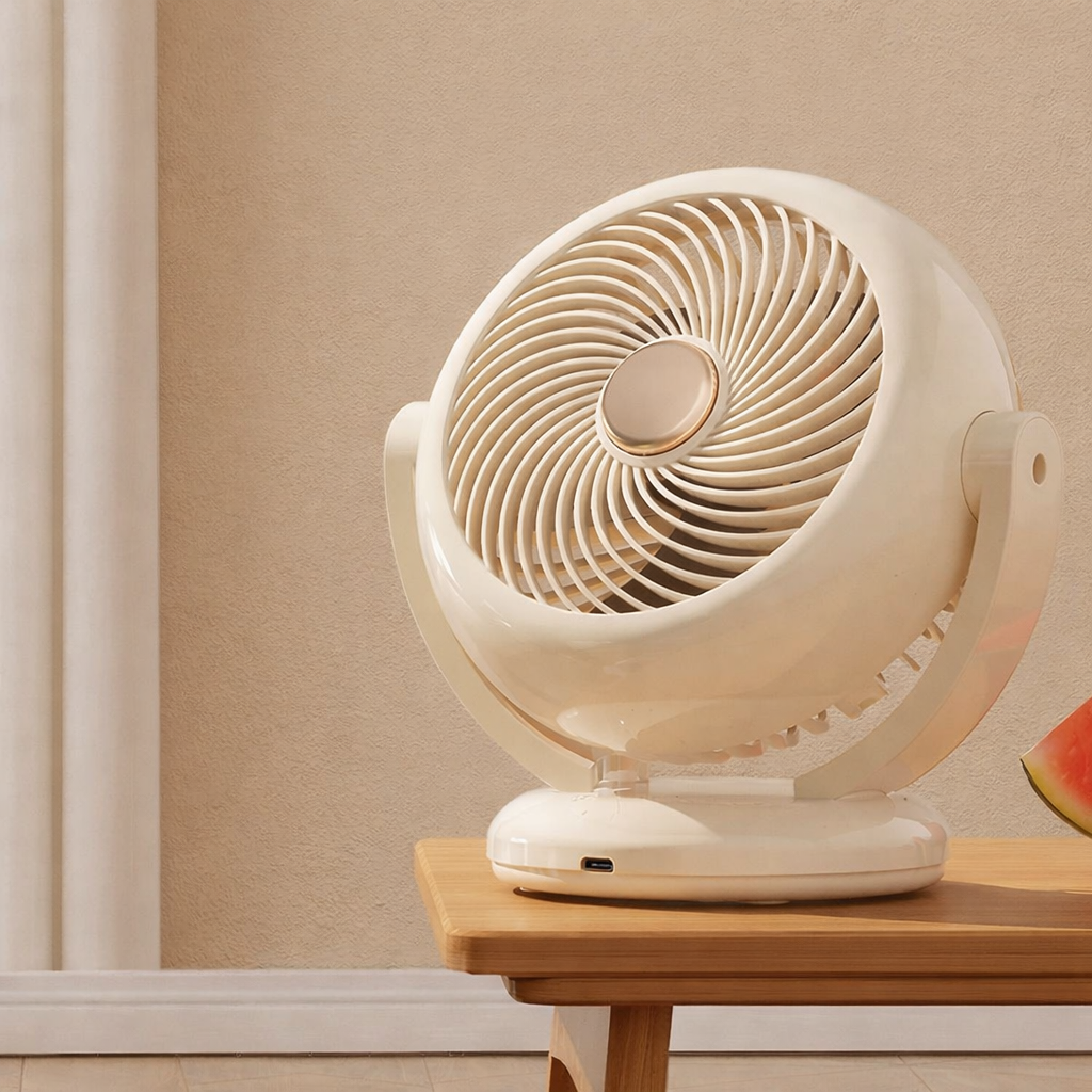 Compact, adjustable, and rechargeable personal fan in a sleek design, ideal for powerful portable cooling.