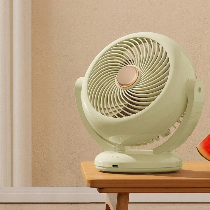 Cordless travel mini fan, rechargeable via USB, offers refreshing breeze anywhere you need a personal cooling device.