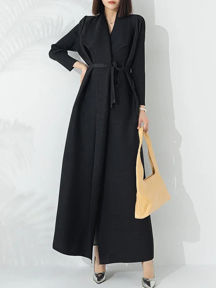 Elegant women's fall/winter A-line coat. Belted waist & funnel neck offer stylish warmth & chic design.