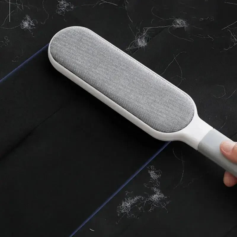 Reusable microfiber dust brush with soft bristles, ideal for cleaning dust, lint, and pet hair from various surfaces efficien