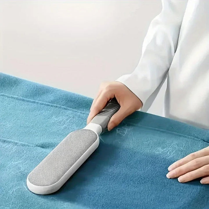 Reusable microfiber dust brush with soft bristles, ideal for cleaning dust, lint, and pet hair from various surfaces efficien