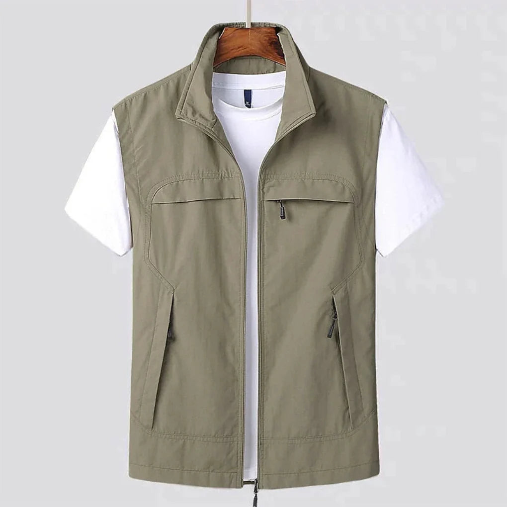 Functional men's quick-dry vest, active style. Sleeveless top with utility pockets, great for casual wear & outdoors.