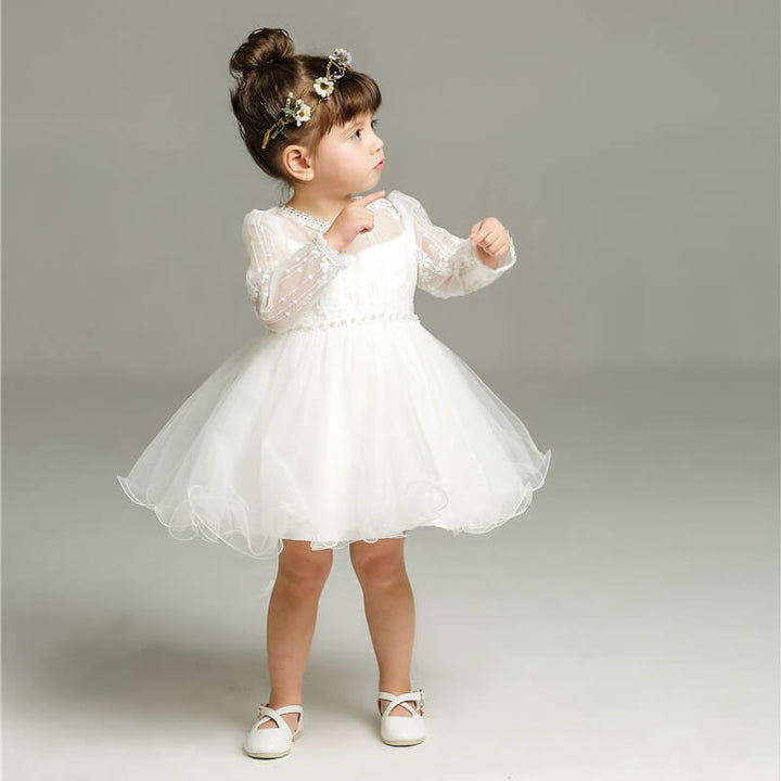 Elegant Clara girls' polka dot party dress. Perfect for special occasions, birthdays, and festive wear.