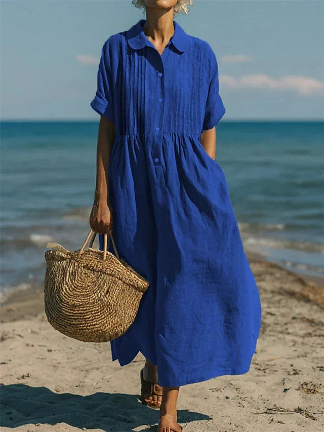 Comfortable relaxed fit women's maxi shirt dress featuring delicate pintuck details and a collared neckline.