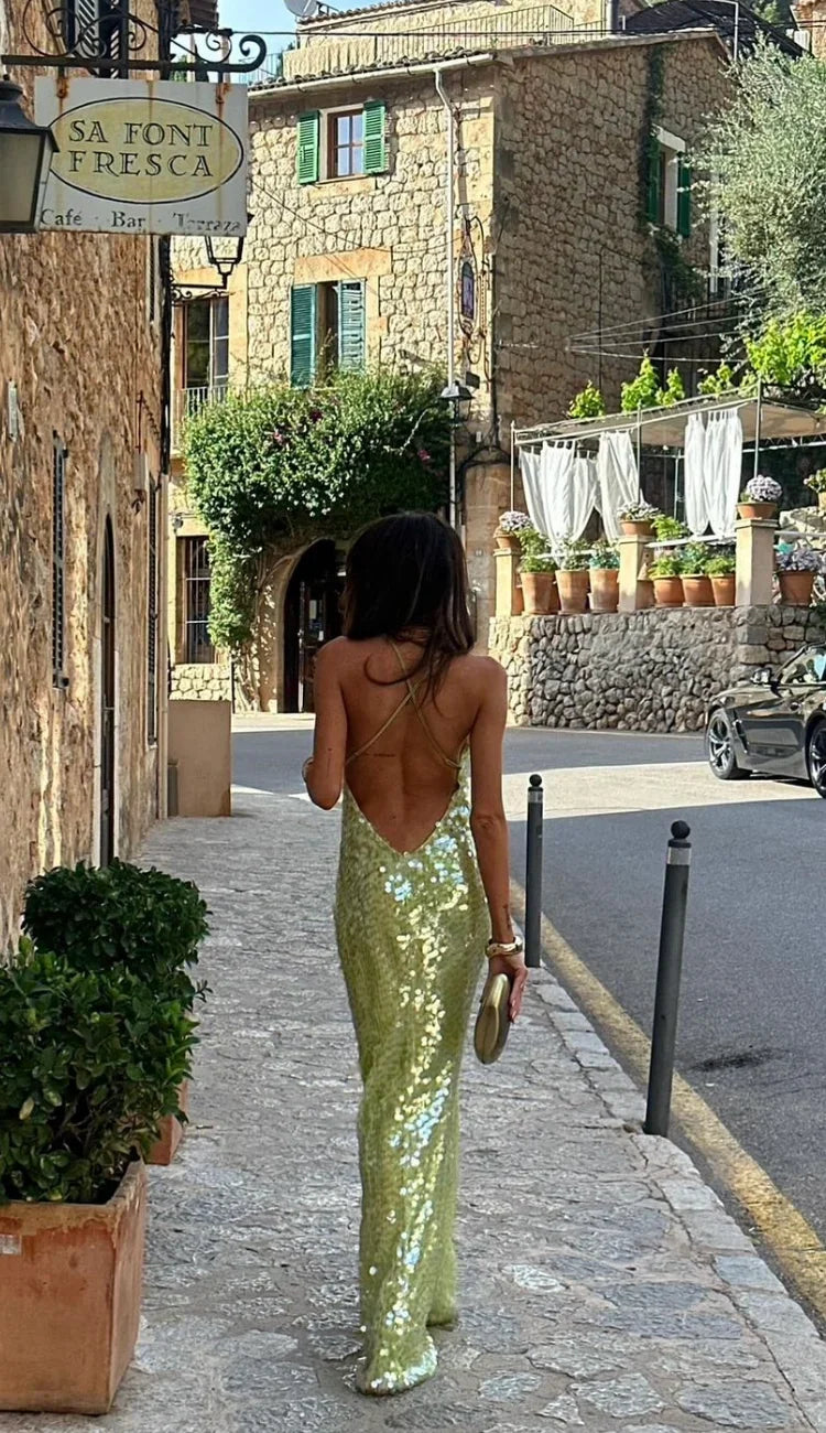 Luxurious women's green sequin backless maxi dress, stunning formal wear for evening galas.