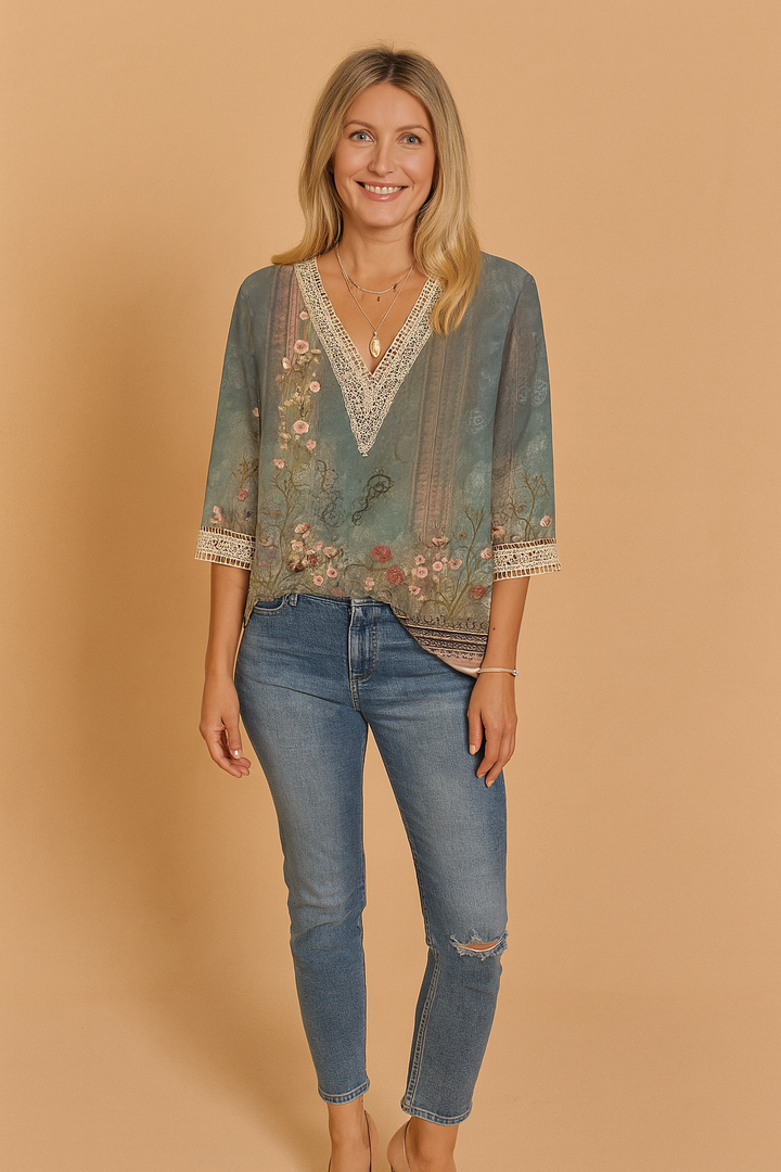 Green romantic lace trim blouse for women, featuring a subtle pattern & feminine V-neck. Versatile three-quarter sleeve top.