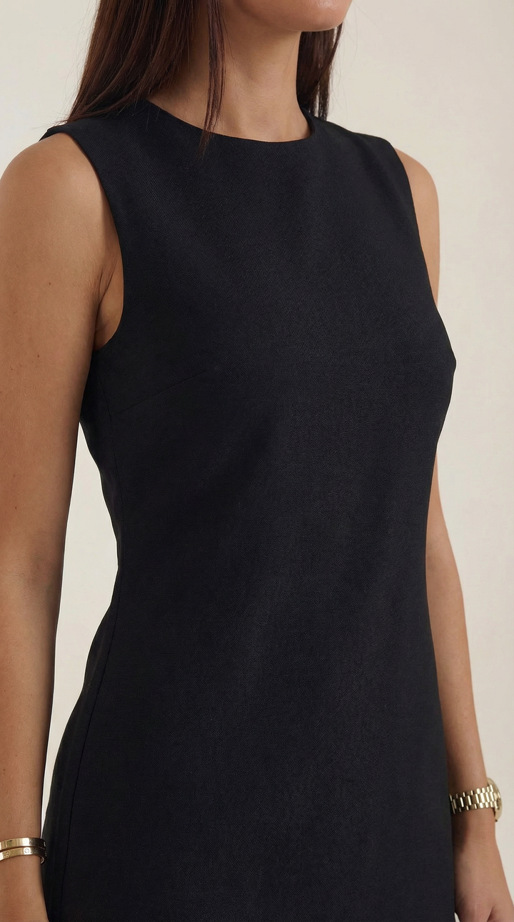 Sleeveless black & white pleated midi dress for women, an elegant choice for spring summer occasions or office fashion.