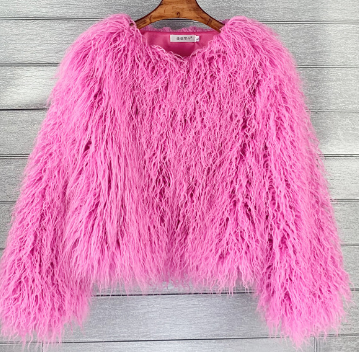 Vibrant fluffy short jacket for women, a cozy fashion statement piece. Ideal for casual winter outfits.