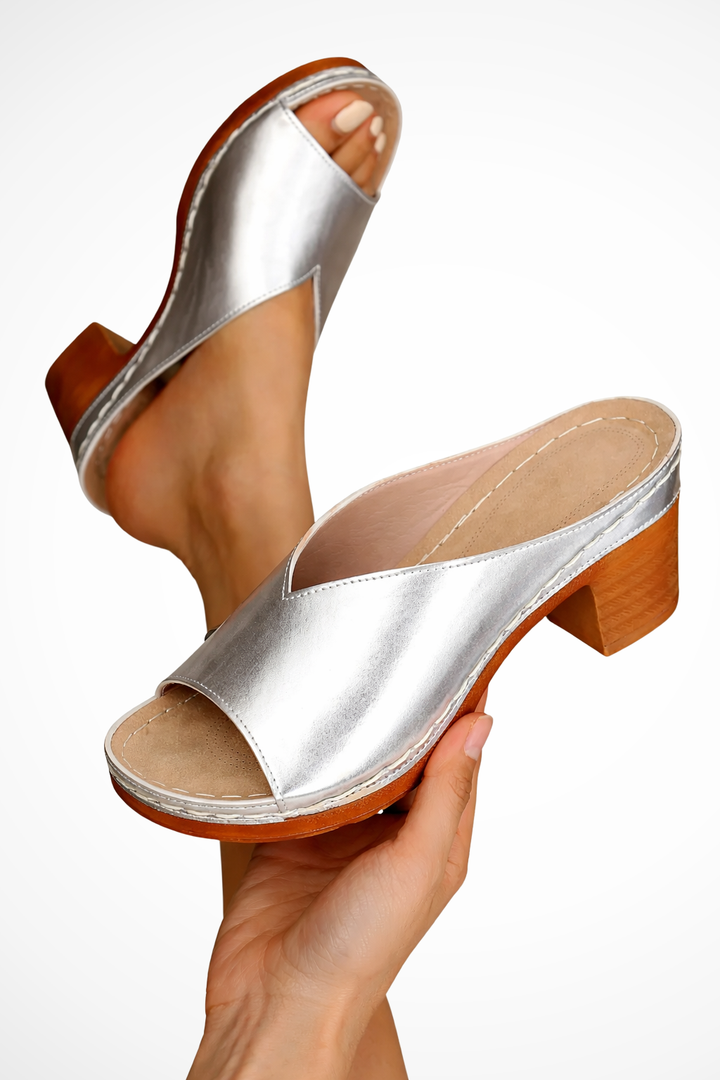 Comfortable Rosalind women's open toe mules with a stable block heel. Easy slip-on design for all-day wear.