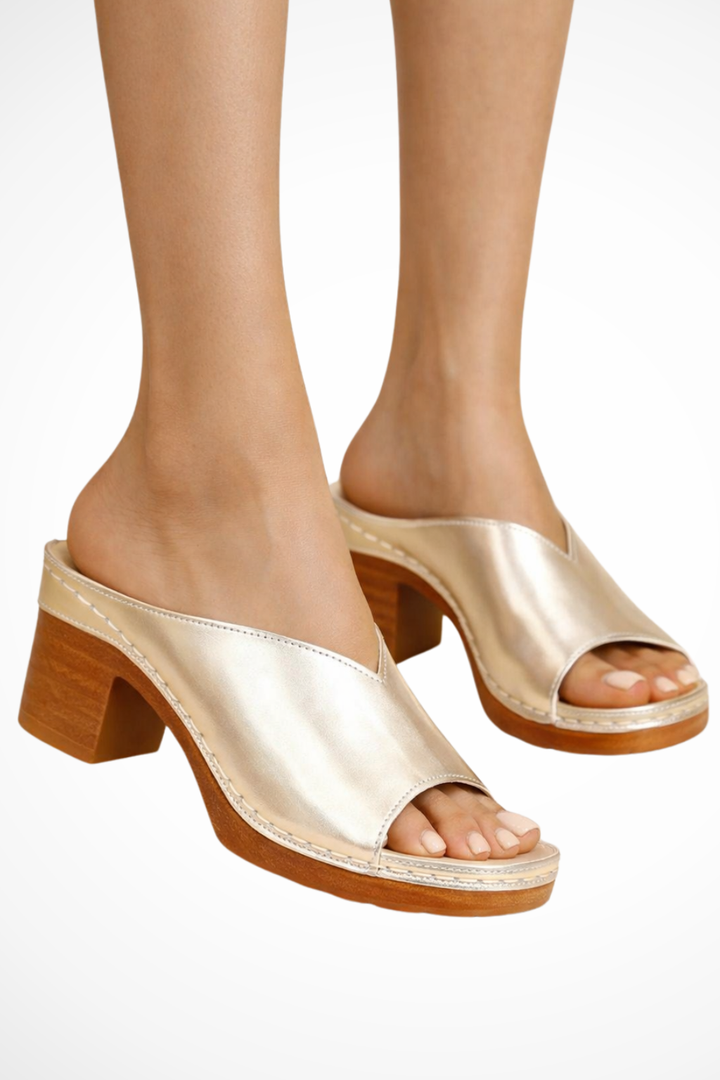 Trendy Rosalind women's fashion mules. Open toe, block heel, and convenient slip-on design for modern style.