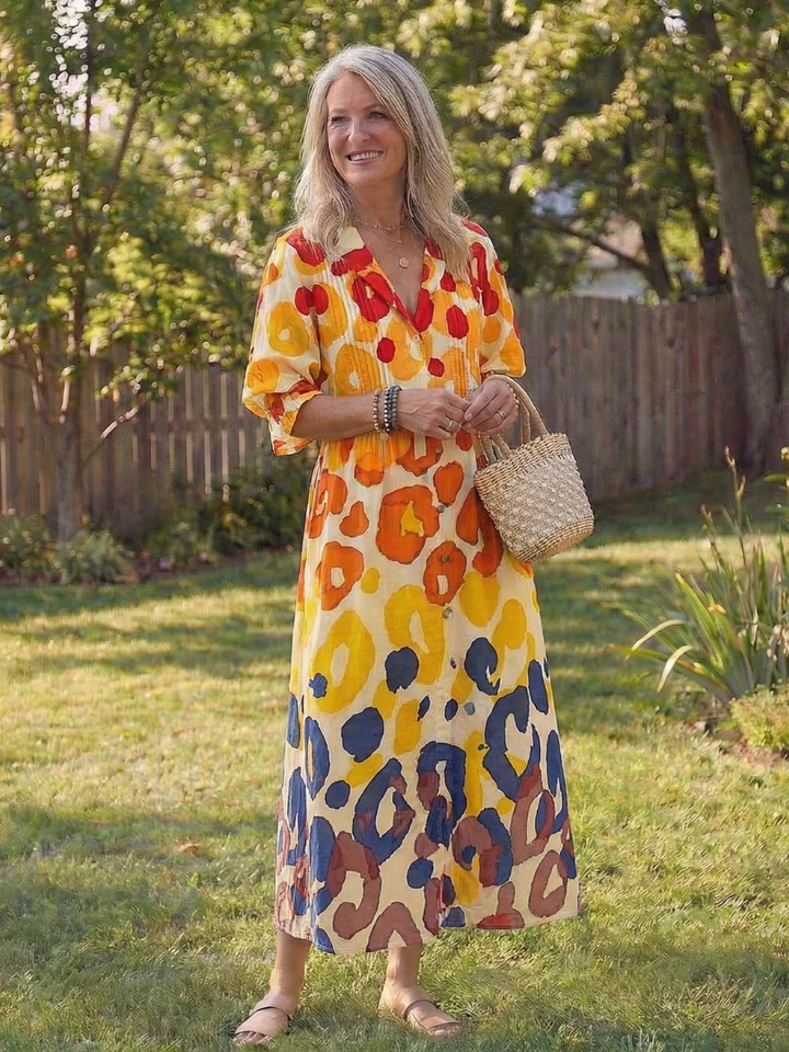 Women's floral boho midi dress with button-front, perfect as a summer sundress for casual elegant style.