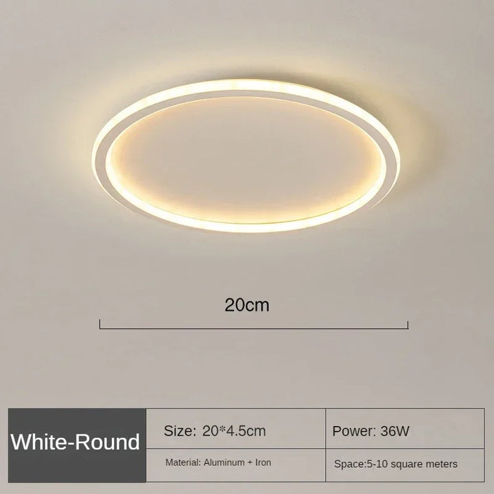 "Round LED ceiling light with Nordic design, offering soft illumination for modern living spaces, made of metal and glass."
