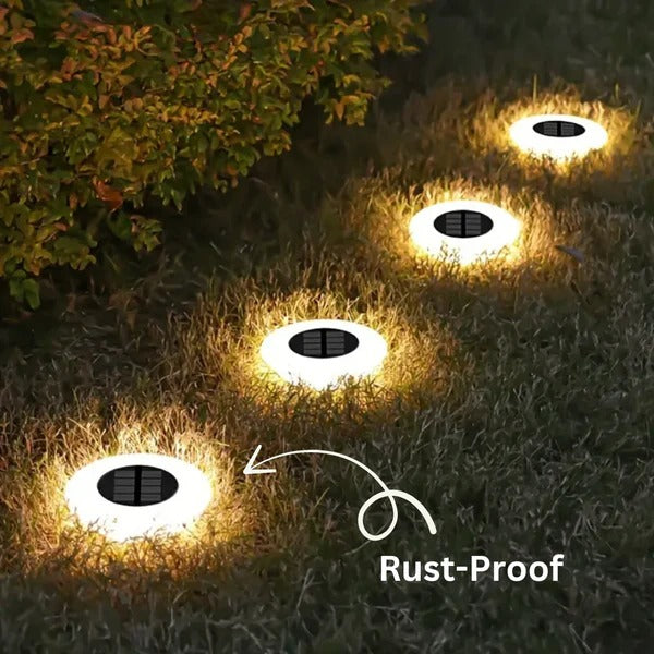Stylish solar garden stake light illuminates pathways & decorates gardens. Rust-proof & IP65 weatherproof.