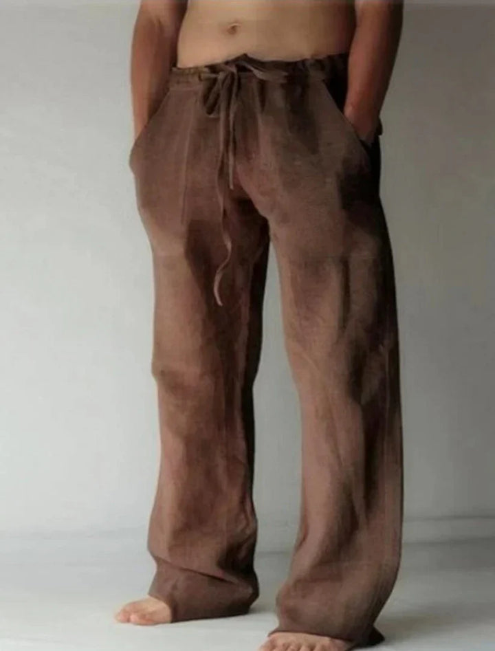 Versatile men's comfort pants. Loose and baggy, these relaxed fit bottoms are ideal for casual occasions.