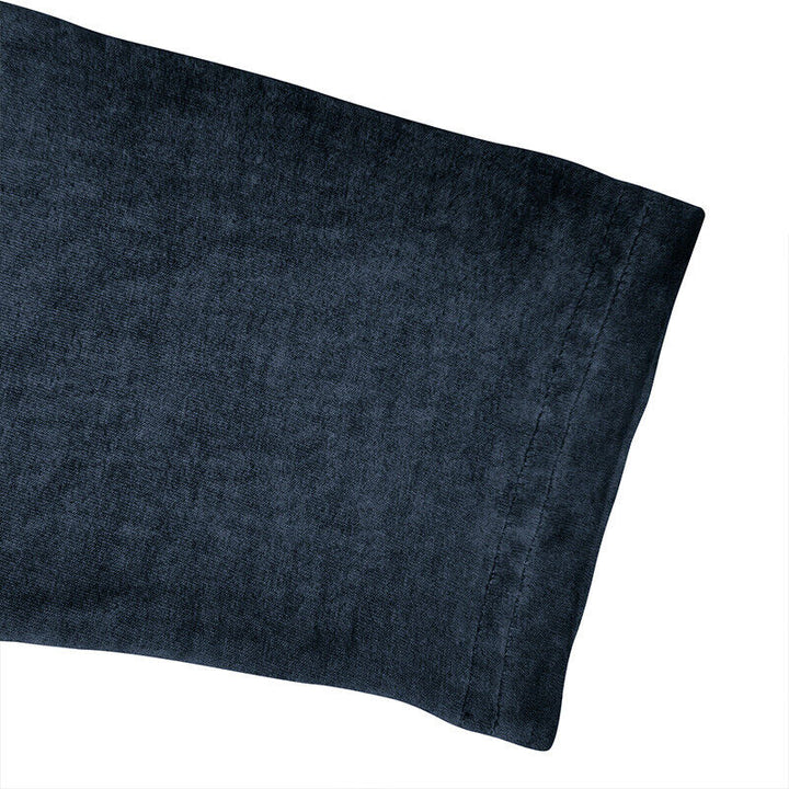 Modern men's long sleeve Henley shirt, a staple for contemporary men's apparel.
