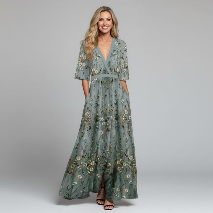 Sage green floral embroidered maxi dress for summer wedding guests & garden parties. Elegant V-neck.