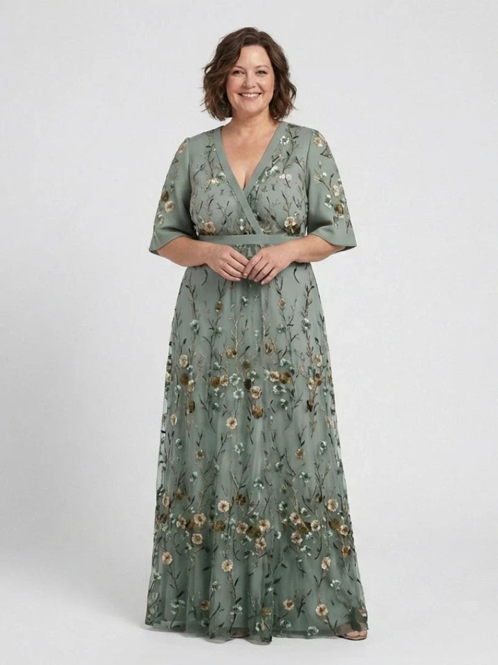 Flowy sage green floral embroidered maxi dress, a stunning choice for summer wedding guests.