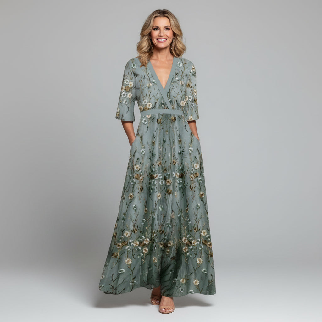 Boho chic women's maxi dress with delicate floral embroidery, perfect for summer holidays & resort wear.