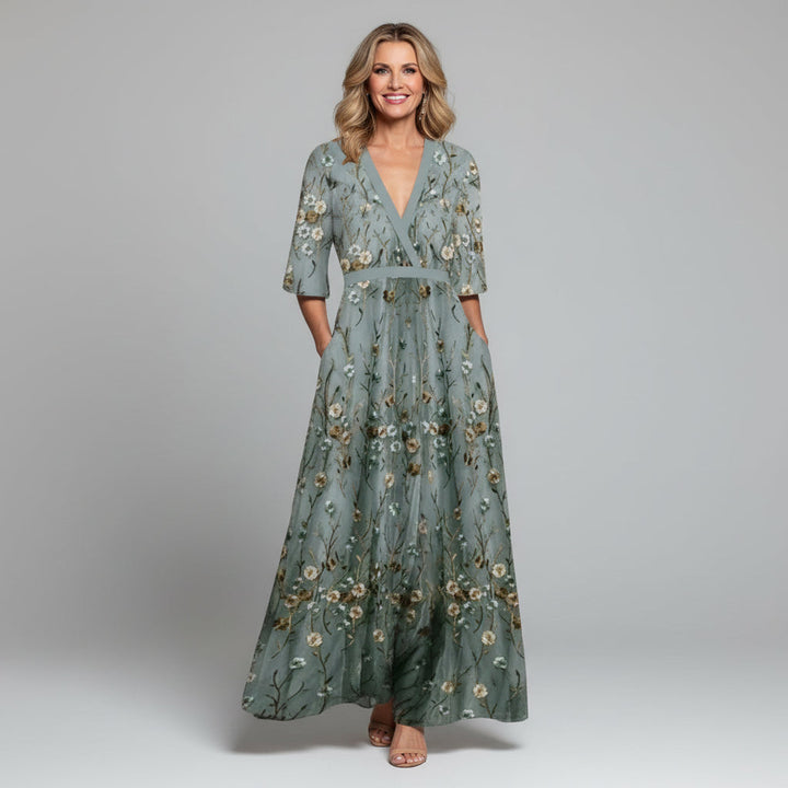 Boho chic women's maxi dress with delicate floral embroidery, perfect for summer holidays & resort wear.