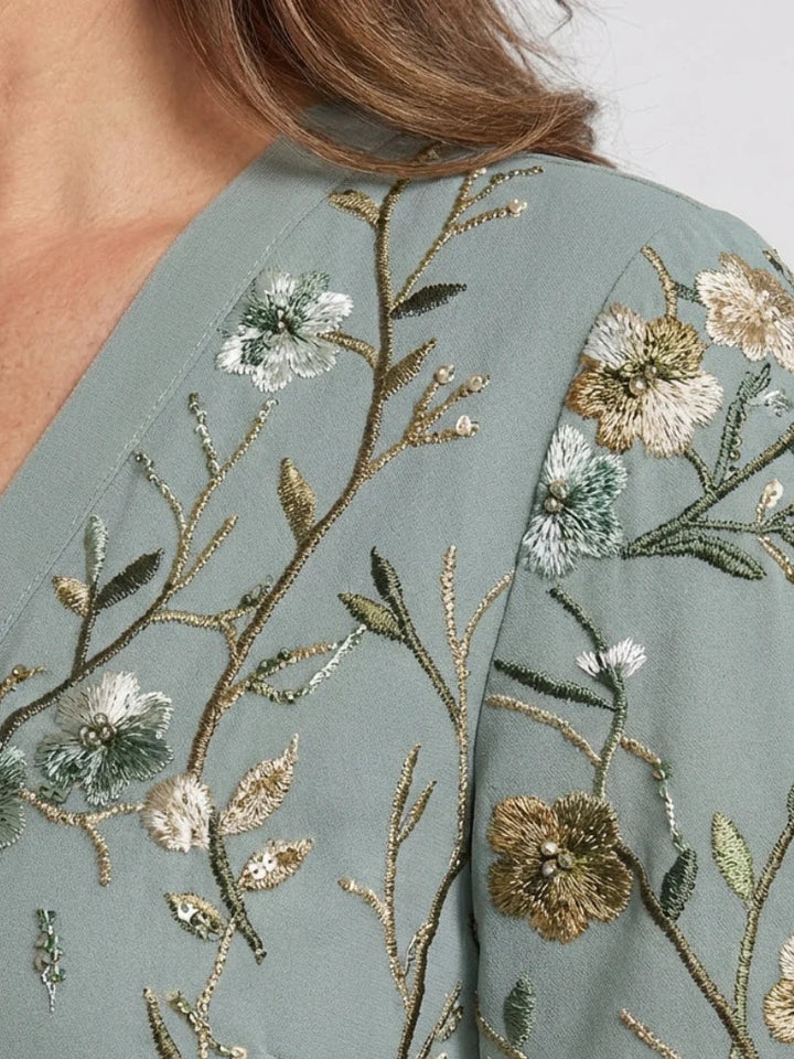 Chic floral embroidered maxi dress for women's summer holidays, resort wear, and special events.